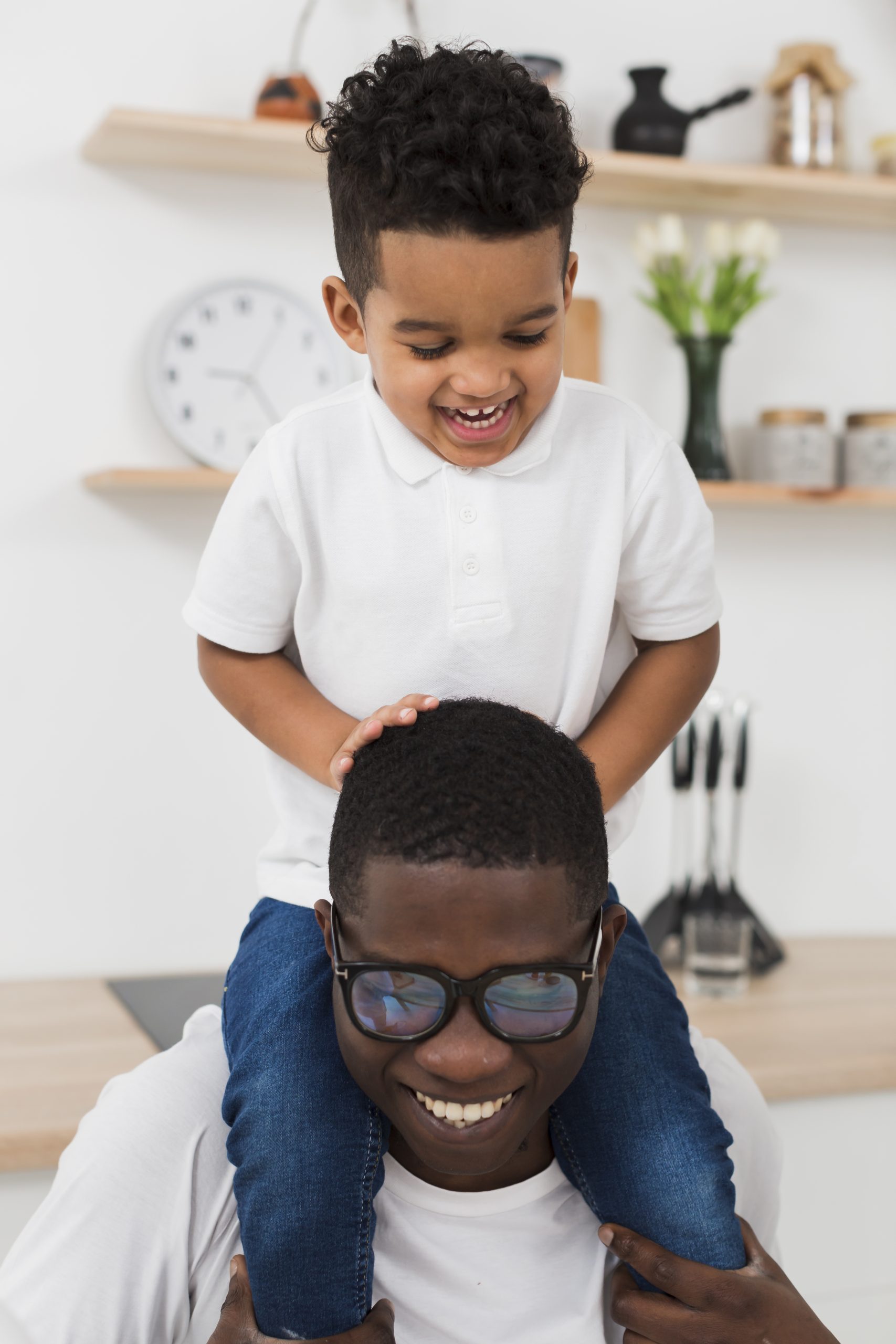 father-son-playing-together-kitchen
